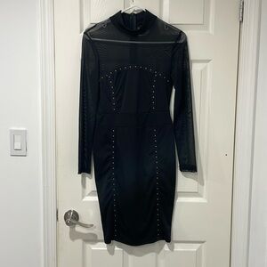 Black see-through dress on shoulders& arms .